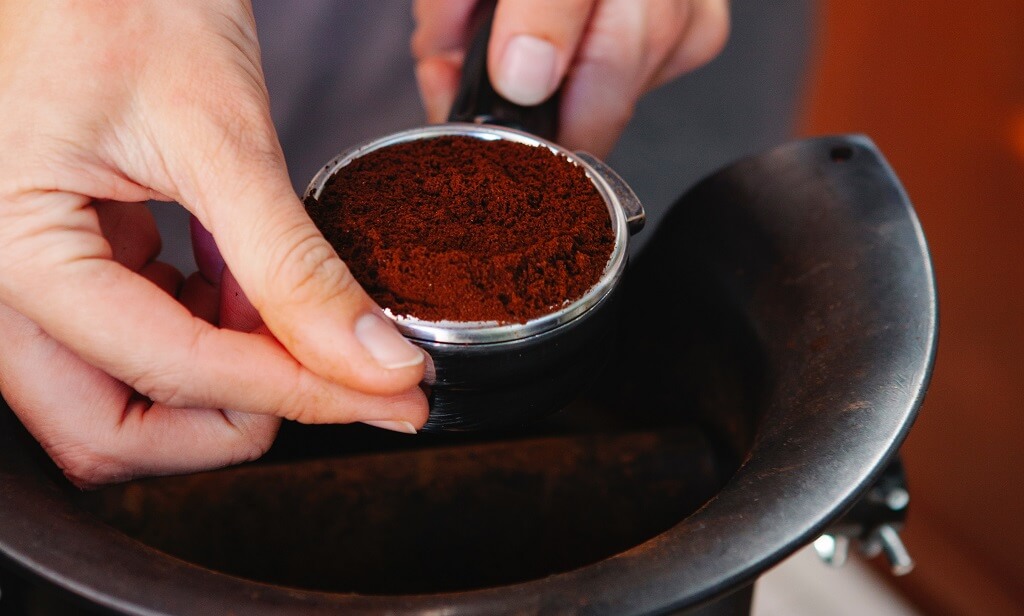 can coffee grounds go down the kitchen sink