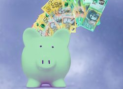 Money into green piggy bank. Sydneysiders can save on new solar hot water systems through government rebates.